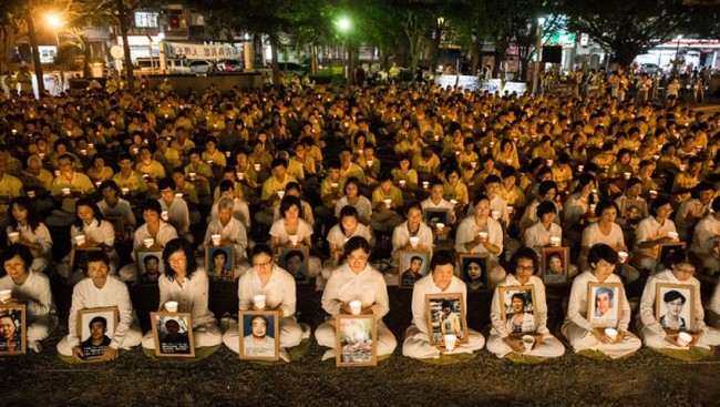 Акция памяти сторонников Фалуньгун, погибших в результате репрессий в Китае. Тайвань. Фото: The Epoch Times