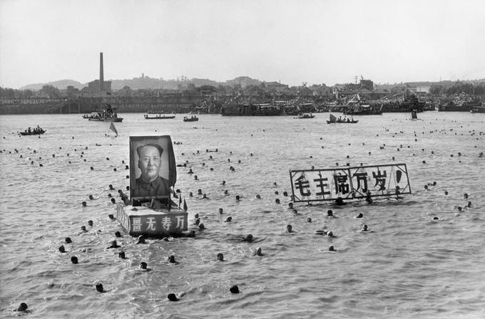 A picture released by the Chinese official news agency shows some 5,000 Chinese following Chairman Mao Zedong's example swimming 02 September 1967, in the Yangtze river, near Wuhan, displaying floating portraits of the Great Helmsman and slogans calling for him a '10,000 year' life. Right after swimming in the Yangtze river, Mao went back to Beijing to head the Great Proletarian Cultural Revolution against his former comrade Lin Piao and Deng Xiaoping, bringing Red China close to a civil war. CHINA OUT AFP PHOTO/XINHUA (Photo credit should read STR/AFP/Getty Images)