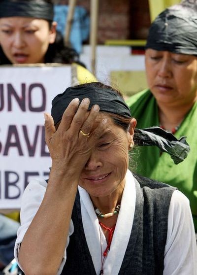 Фотообзор:  Акции протеста против кровавого подавления в Тибете прошли во многих странах