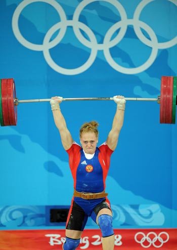 Оксана Сливенко - серебряный призер Олимпиады по тяжелой атлетике. Фото: JUNG YEON-JE/AFP/Getty Images