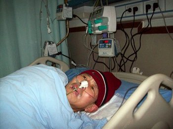 Лэй Чженся после избиения полицейскими попал в больницу. Фото с minghui.org