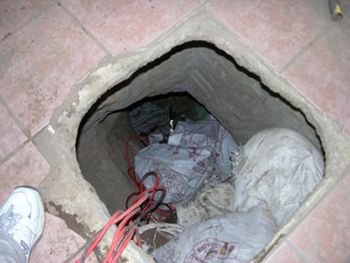 Типичный тоннель, вырытый торговцами наркотиков для переправки контрабанды через границу США-Мексика. Фото правительства США