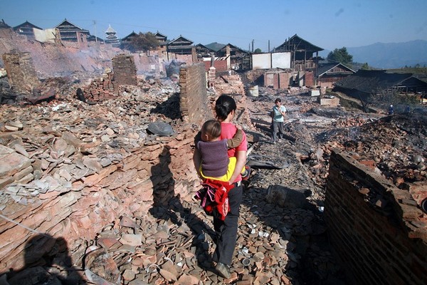 В результате пожара в деревне Тудун сгорело более 300 домов. Фото с epochtimes.com