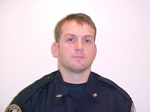 Полицейский Лейквуда сержант Марк Реннинджер (Mark Renninger), который был убит 29 ноября 2009 наряду с тремя другими Лейквудскими полицейскими. Фото: Stephen Brashear/Getty Images