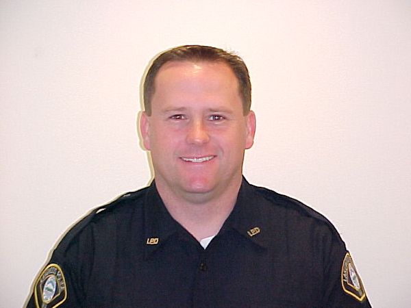 Полицейский Лейквуда  офицер Грег Ричардс (Greg Richards), ), который был убит 29 ноября 2009 наряду с тремя другими Лейквудскими полицейскими. Фото: Stephen Brashear/Getty Images