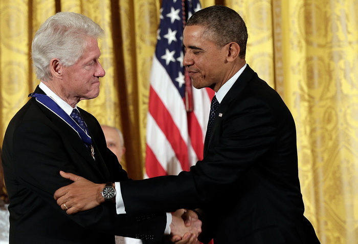 Билл Клинтон (L), президент США Барак Обама (R). Фото: Win McNamee/Getty Images