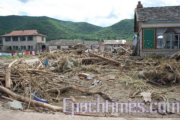 Наводнение на северо-востоке Китая принесло масштабные разрушения. Фоторепортаж