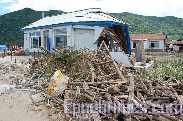 Наводнение на северо-востоке Китая принесло масштабные разрушения. Фоторепортаж