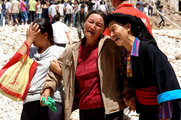 Число жертв оползня в Китае превысило 300 человек. Фоторепортаж