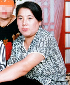 Жительница северо-восточного Китая находится в критическом состоянии после пыток