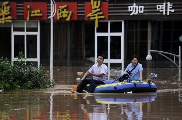 Наводнения в Китае охватили практически всю страну. Фоторепортаж