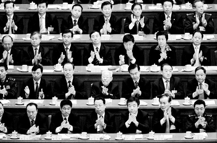 Китайские чиновники на 17 съезде партии 21 октября 2007 года в Пекине. Фото: Andrew Wong/Getty Images