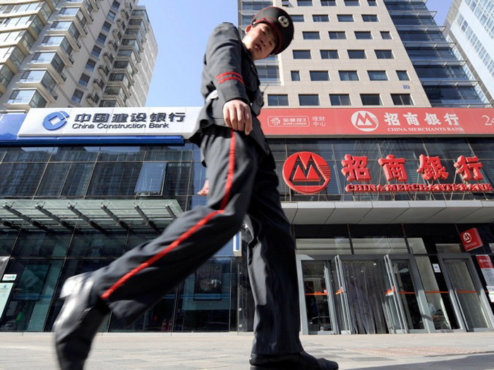 В Китае растёт количество «неработающих» кредитов. Фото: Liu Jin/AFP/Getty Images