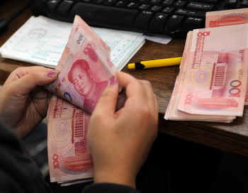 Власти  КНР подняли порог бедности до 1 доллара в день
