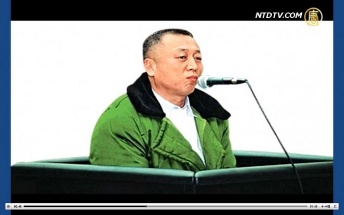 Ли Чжуан в зале суда Чунцина, где он был приговорён к 18 месяцам тюремного заключения по обвинению в лжесвидетельстве. Обвинение было полностью сфабриковано. Фото: NTD Television