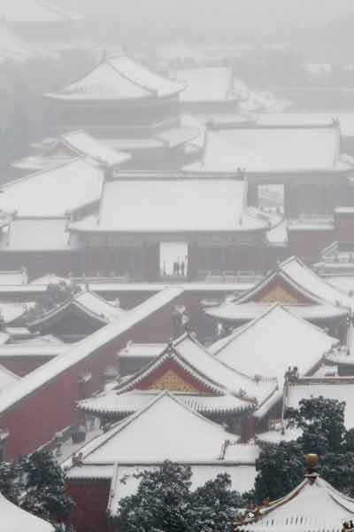 Самые обильные за последние почти 60 лет осадки снега выпали в Пекине и Тяньцзине. Фото: LIU JIN/AFP/Getty Images