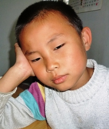 Хун Ян, 10-летний сын Тайнь Юйжун. Фото с epochtimes.com