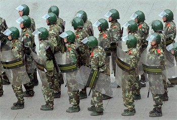 Власти Китая могут использовать борьбу с терроризмом для подавления антиправительственных выступлений. Фото: AFP PHOTO/TEH ENG KOON