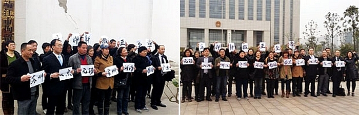 Десятки китайских адвокатов требуют освободить своего коллегу Ван Цюаньчжана, который защищал сторонника Фалуньгун. Город Цзинцзян. Апрель, 2013 года. Фото с epochtimes.com