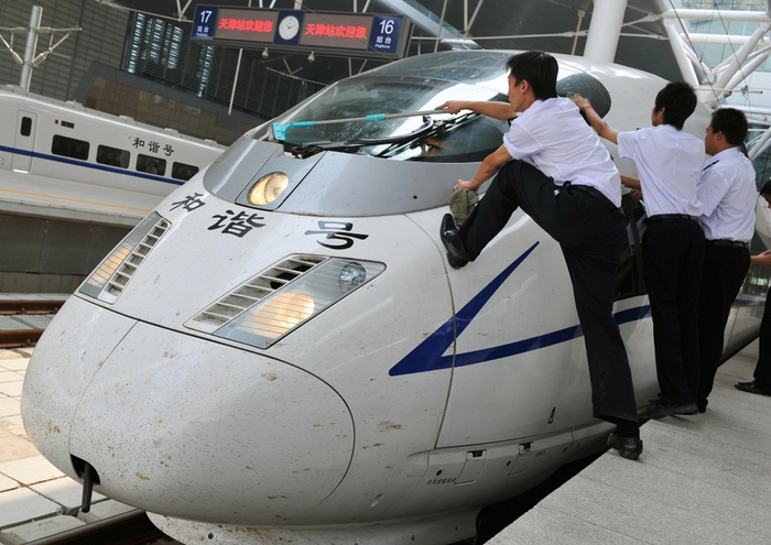 Китайские железные дороги работают в убыток. Фото: TEH ENG KOON/AFP/Getty Images
