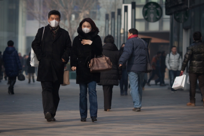 Пекин задыхается от смога. Фото: Ed Jones/AFP/Getty Images