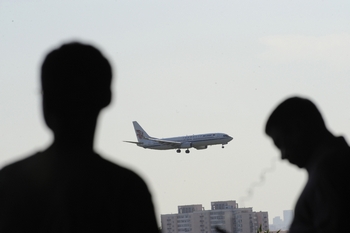Китайские миллионеры уезжают из Китая. Фото: WANG ZHAO/AFP/GettyImages