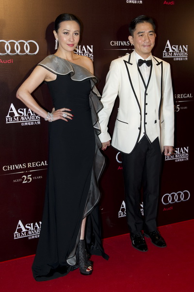 Вручение призов азиатским фильмам. Гонконгский актер Тони Люн с супругой - актрисой Кариной Лау на вручении призов азиатским фильмам. Фото: Victor Fraile/Getty Images