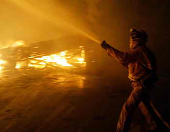  Во время тушения пожара в городе Ярнелл штата Аризона погибли 19 пожарных, судьба шестерых неизвестна, 22 получили ожоги. Фото: ROBYN BECK/AFP/Getty Images