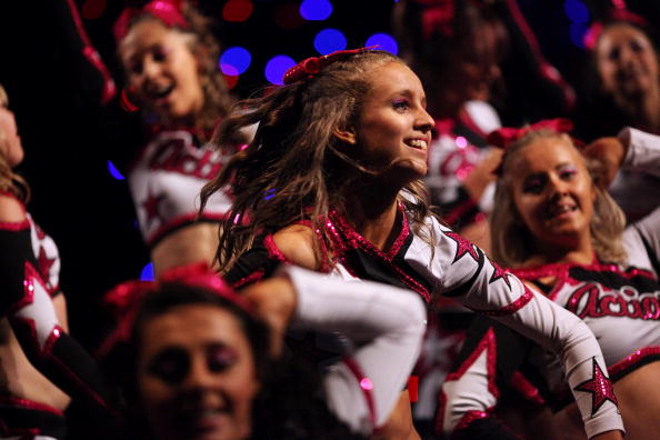 Танцевальный конкурс чирлидеров (BCA International Cheerleading and Dance Competition) прошел в Англии. Фото: Dan Kitwood/Getty Images