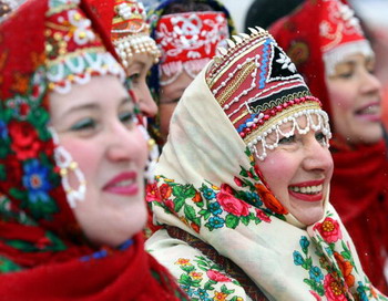 Масленичная неделя по Руси идет, блины, масло и мед несет. Фото: MARTIN BUREAU/AFP/Getty Images