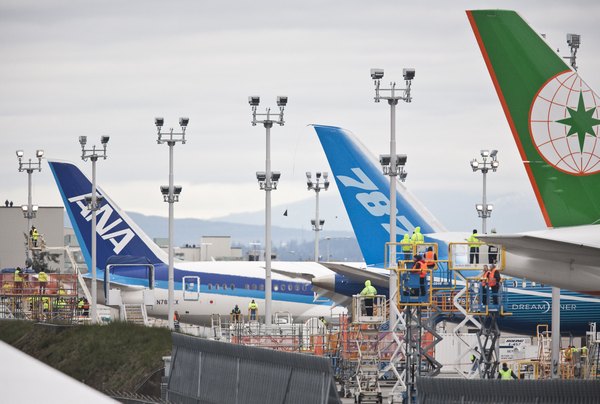 Полет нового реактивного самолета, Боинга-787, состоялся во вторник. Фоторепортаж