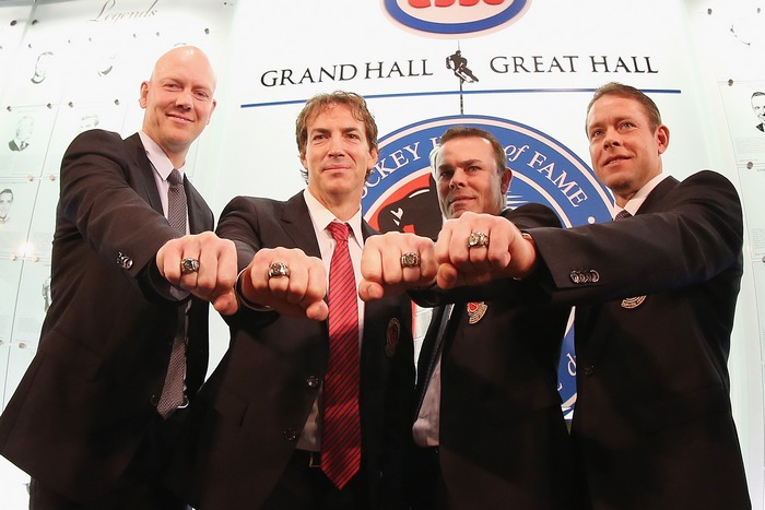 Зал Хоккейной Славы в Торонто, Канада, 2012 год.  Четыре бывших игрока НХЛ (Павел Бурре справа). Фото:  Bruce Bennett/Getty Images.