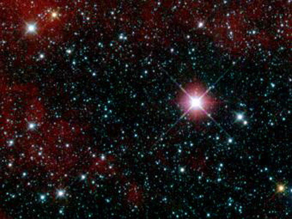 Космические подарки к Новому году от телескопа WISE. Первый снимок, сданный инфракрасным телескопом WISE. Это пробный снимок. Ученые специально выбрали область неба с неяркими объектами. На фото - участок в созвездии Киля. Фото: NASA/JPL