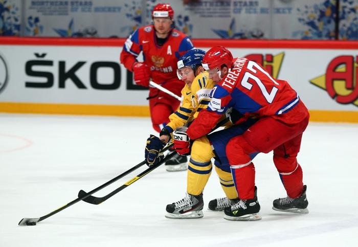 Сборная России по хоккею разгромила команду Швеции со счётом 7:3. Фоторепортаж с матча
