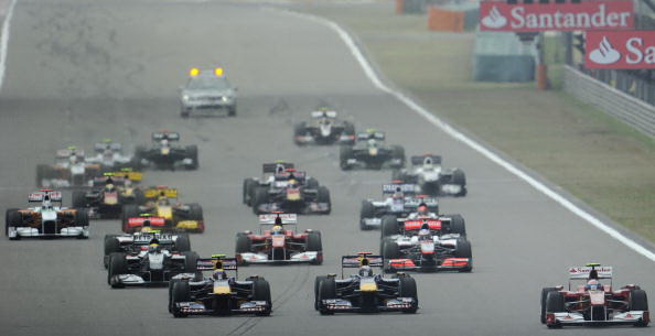 Виталий Петров финишировал седьмым на Гран-при Китая. Фоторепортаж