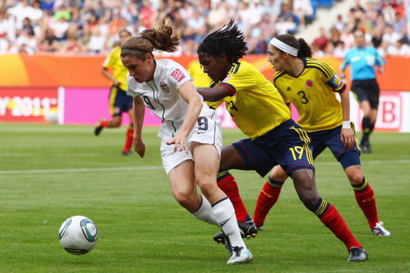 Фоторепортаж с футбольного матча между женскими сборными  США и Колумбии. Фото: Joern Pollex/ Alex Grimm/Getty Images