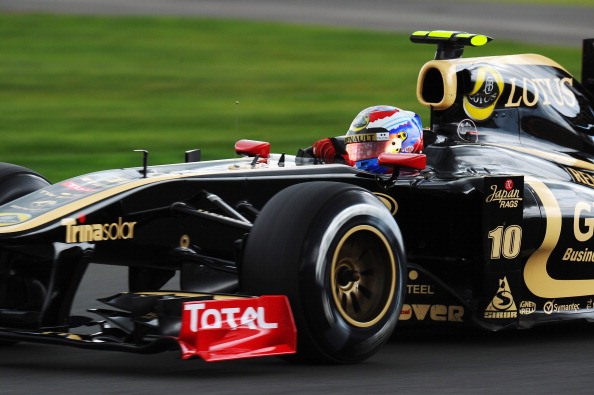 Себастьян Феттель  выиграл третий этап «Формулы-1» Гран-при Великобритании. Фоторепортаж с  трассы «Сильверстоун»
