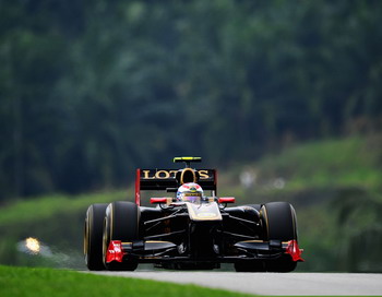 Гран при Малайзии: Виталий Петров сошёл с дистанции. Фото: Clive Mason/Getty Images