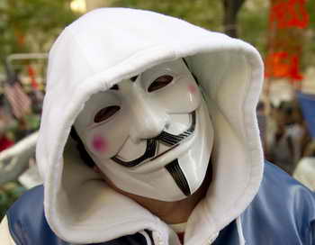 Двенадцатилетний канадский школьник из Монреаля помогал хакерам из Anonymous. Фото: DON EMMERT/AFP/Getty Images Фото: DON EMMERT/AFP/Getty Images Фото: DON EMMERT/AFP/Getty Images