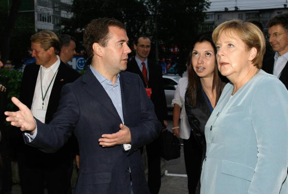 Медведев и Меркель встретились  в Екатеринбурге. Фоторепортаж
