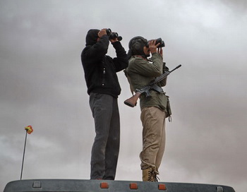 Бойцы ливийской оппозиции. Фото РИА Новости
