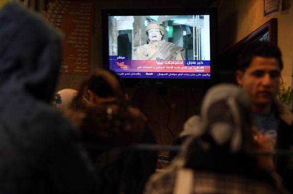 Муаммар Каддафи объявил войну своему народу. Фото: JOEL SAGET/AFP/Getty Images