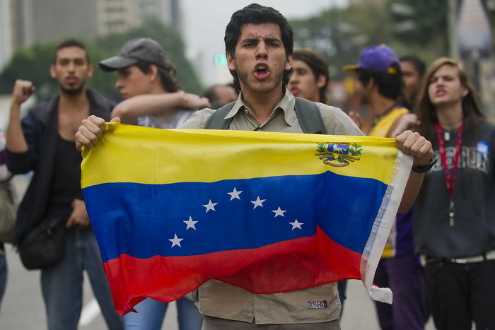 В ходе протестов в Венесуэле погибли 7 человек. Фото: RAUL ARBOLEDA/AFP/Getty Images