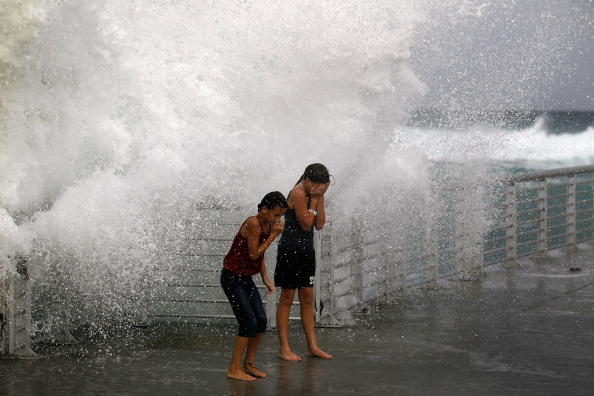 Фоторепортаж о приближающемся урагане «Айрин» на пляжах Флориды. Фото: 