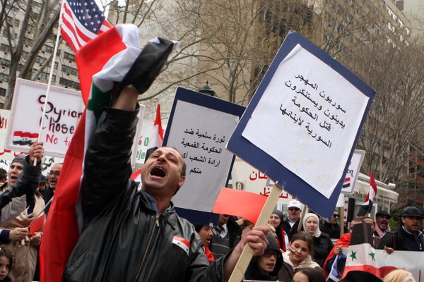 Акция протеста в поддержку оппозиции в Сирии. Фото: Daniel Barry/Getty Images 