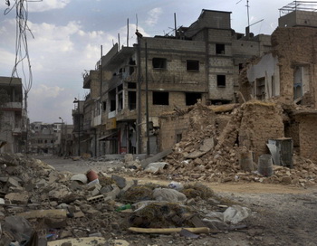 Улица в сирийском городе Кусайр, 20 июня 2012. Фото: AFP/GettyImages