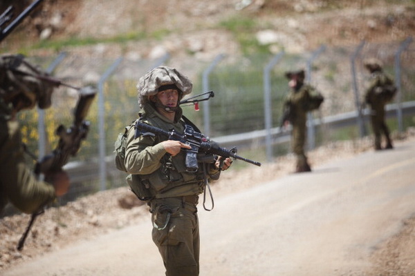 Фоторепортаж об усилении контроля над границей между Израилем и Сирией