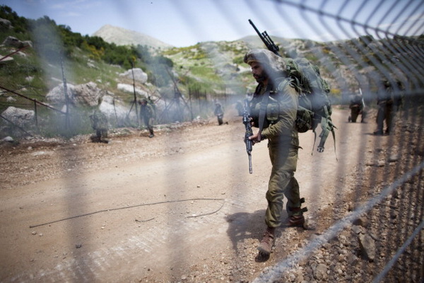Фоторепортаж об усилении контроля над границей между Израилем и Сирией