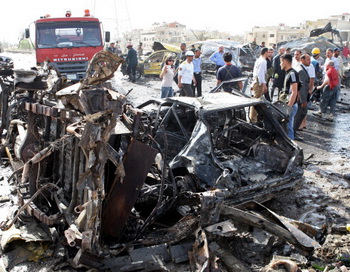 Место взрыва автомобиля, Сирия. Фото: LOUAI BESHARA/AFP/GettyImages