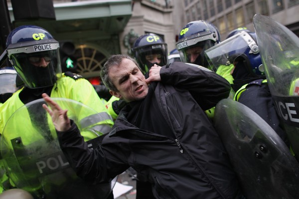 Марш протеста против государственной политики бюджетных сокращений прошел в Лондоне, 26 марта 2011. Фото:  Peter Macdiarmid/Getty Images